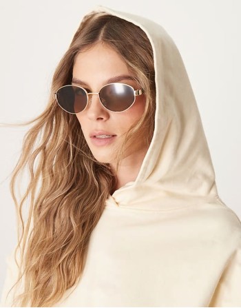 metal oval sunglasses in gold with tort arms