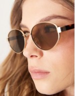 metal oval sunglasses in gold with tort arms